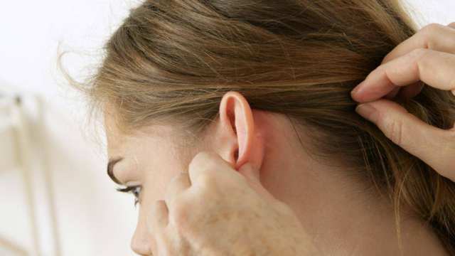 Опухли лимфоузлы за ушами: причины и лечение